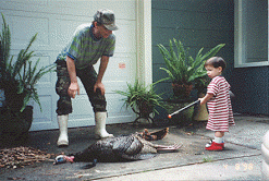 Kenny Morgan and son with Morgan's 500th turkey called to the gun.